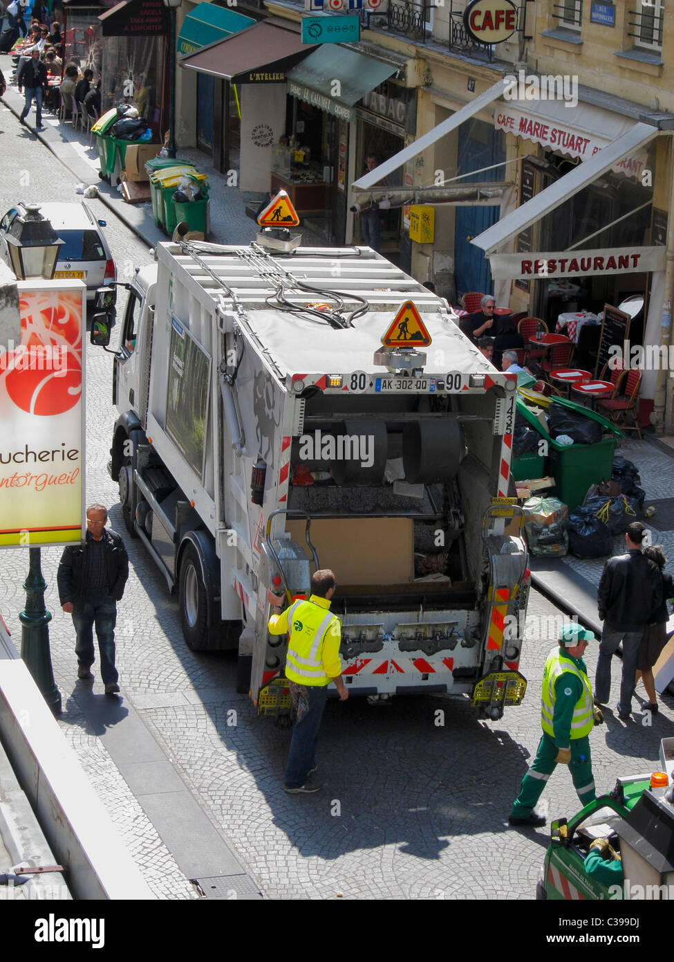 Paris, France, Sanitation Workers Loading Garbage at Back of French