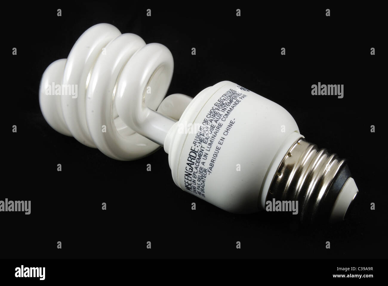 fluorescent light bulb isolated black Stock Photo Alamy