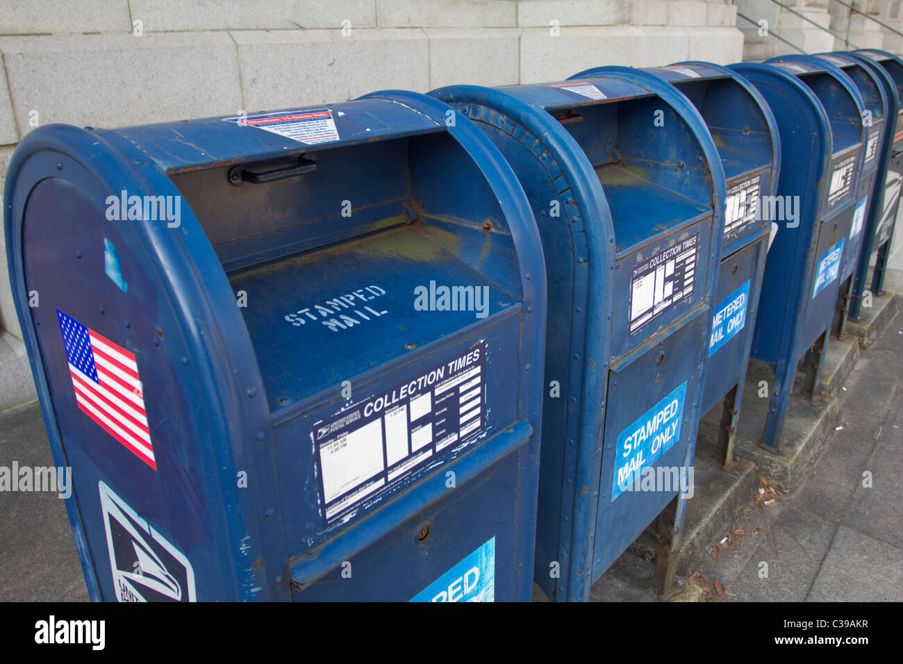 Row of blue mailboxes outside the U.S. Post Office and Courthouse in