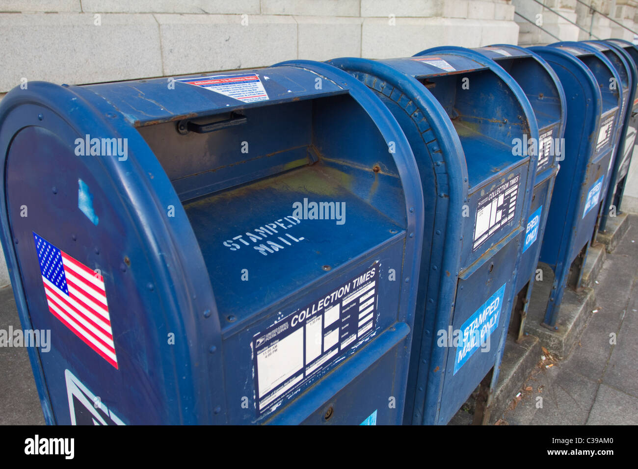 Row of blue mailboxes outside the U.S. Post Office and Courthouse in