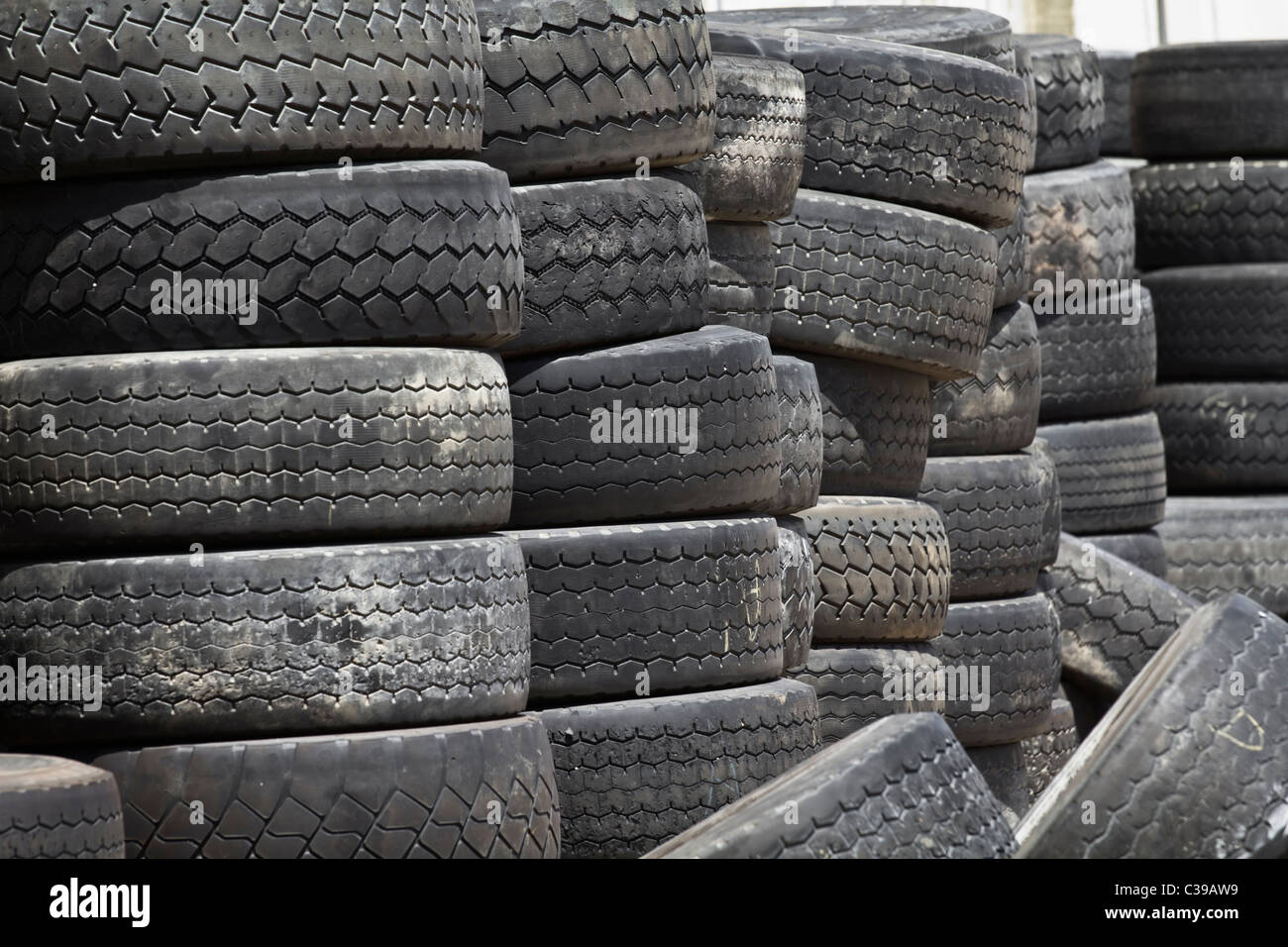 Stacks of old truck tires Stock Photo Alamy
