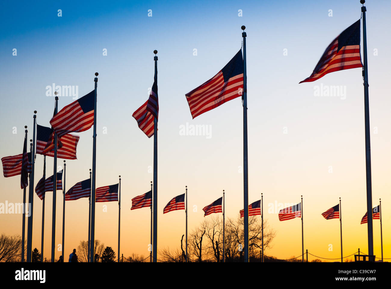 The flags surrounding the Washington Monument in Washington, DC at sunset Stock Photo