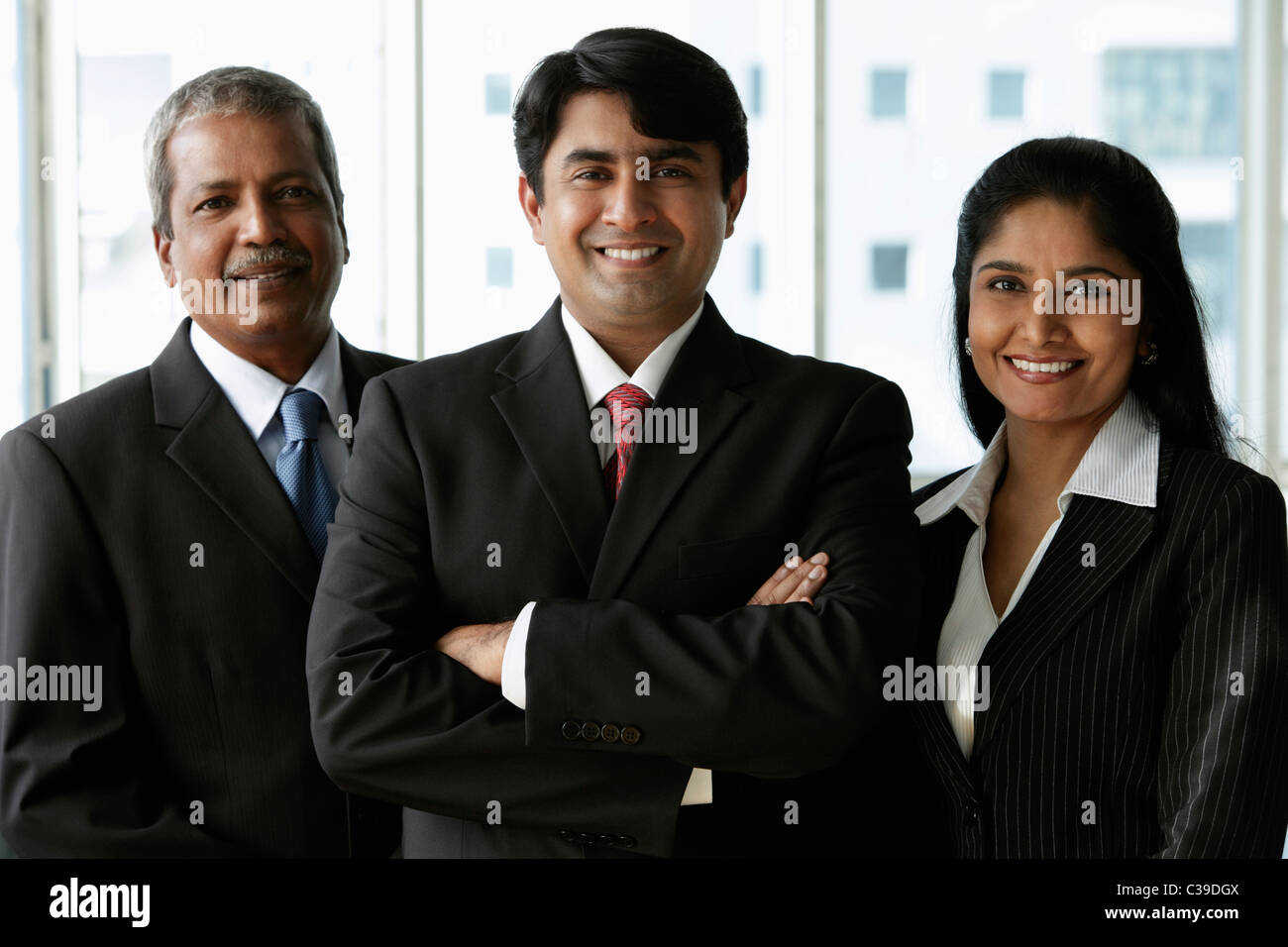 Indian people smiling wearing business attire Stock Photo