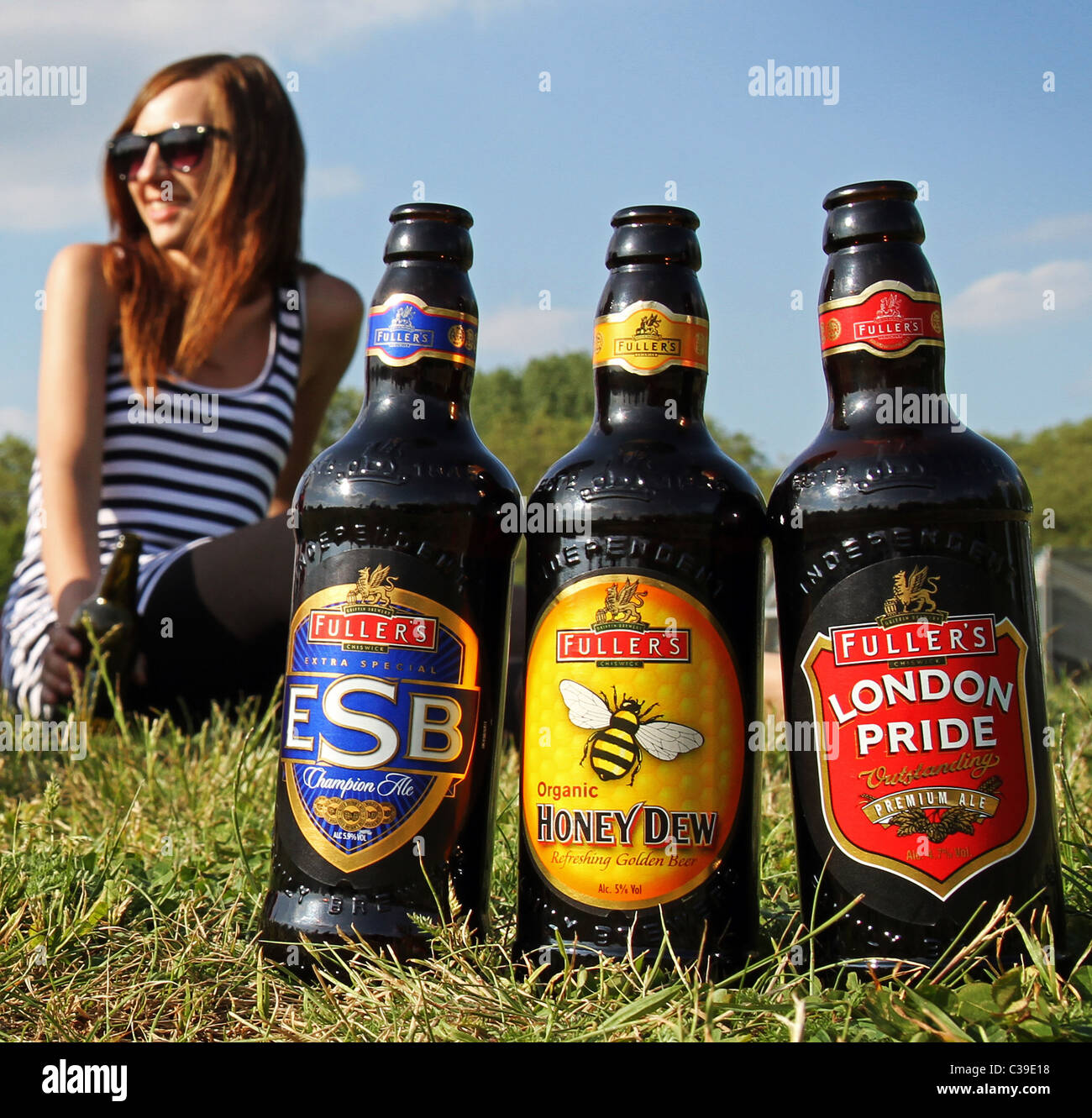Fuller's beers being enjoyed on a sunny day. Stock Photo