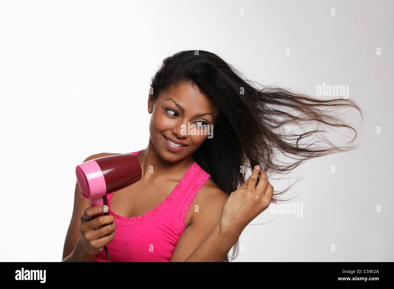 Blow dryer hair hi-res stock photography and images - Alamy