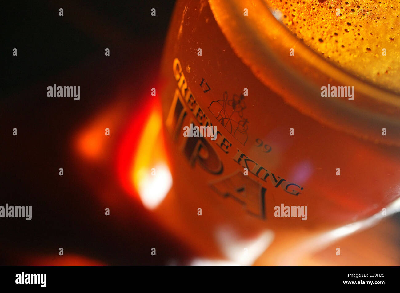 Picture shows a pint of Greene King IPA being served at a London pub. Stock Photo