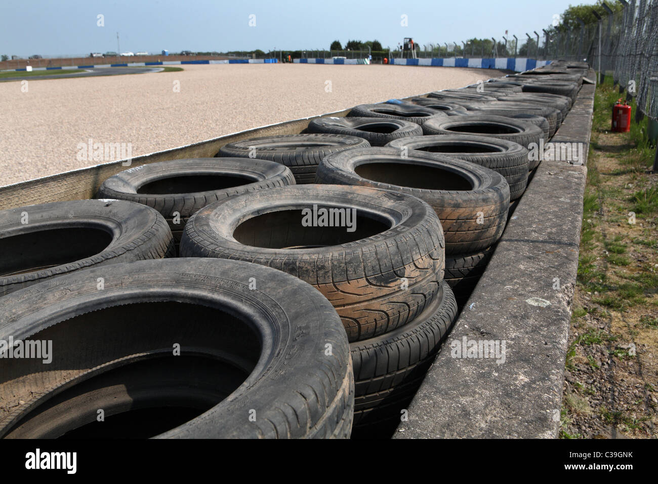 Tyre wall at racing circuit Stock Photo