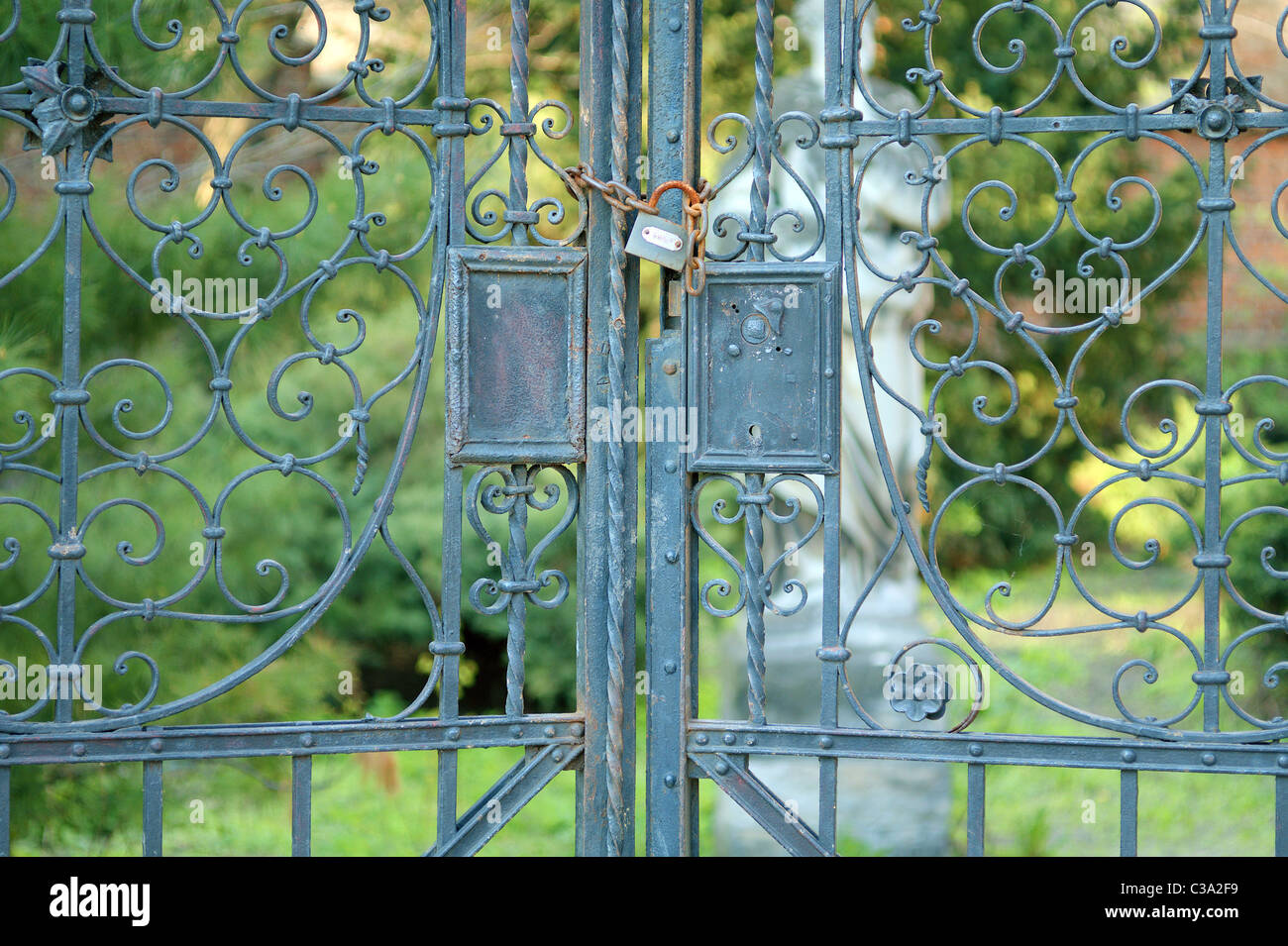 Closed old iron gate Stock Photo Alamy