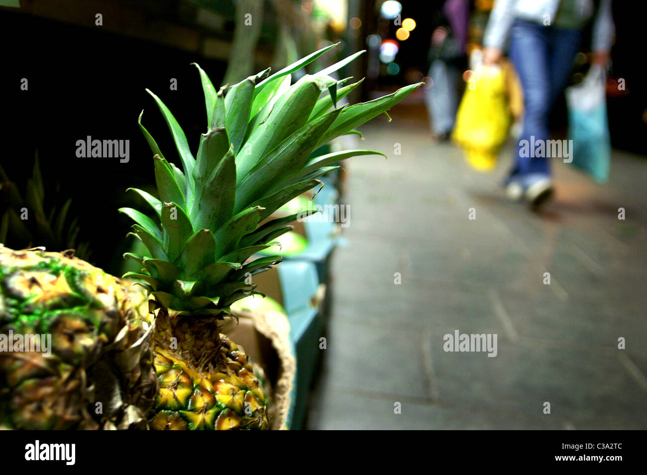 Pineapples for sale in a market Stock Photo Alamy