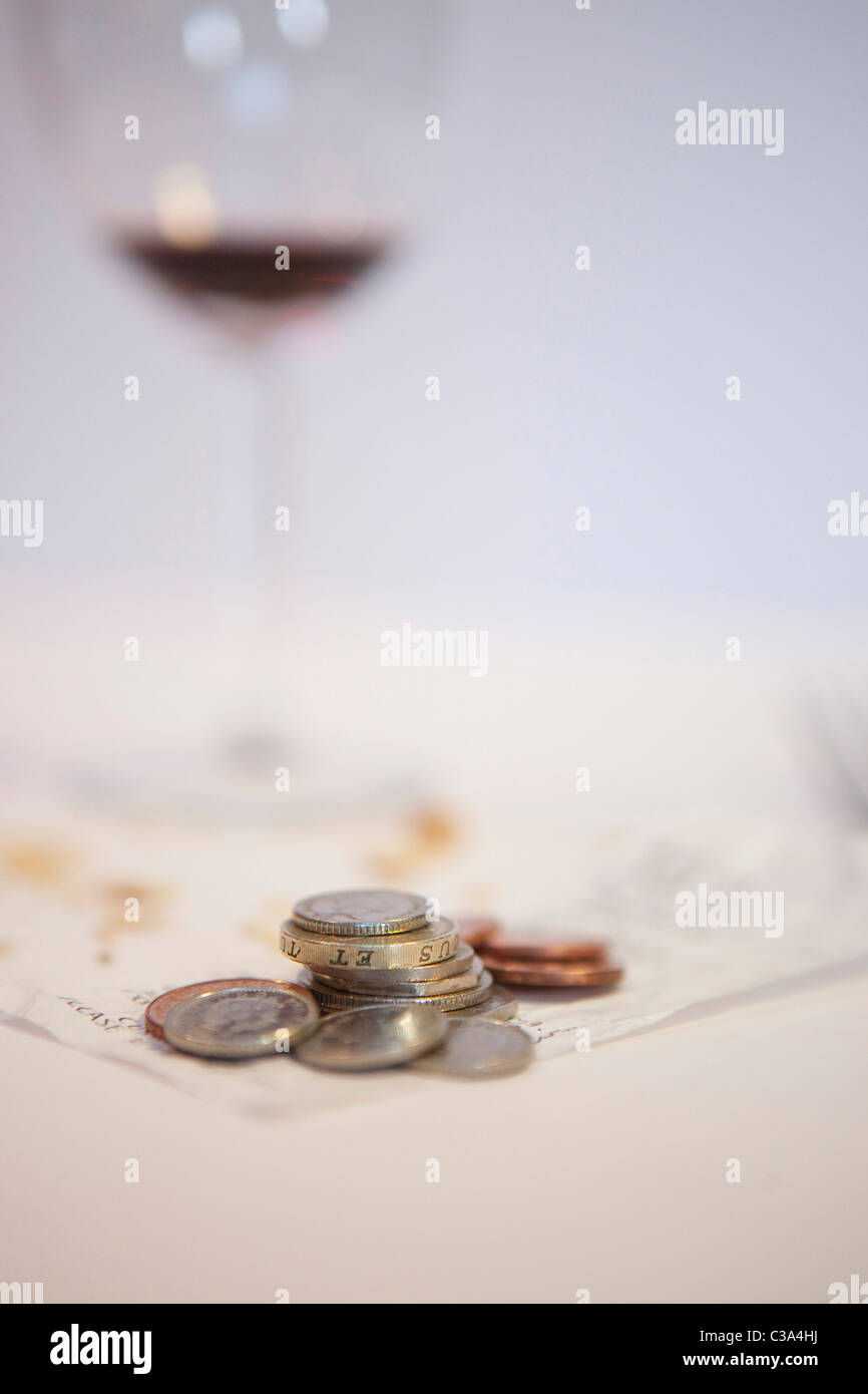 A restaurant bill left after a meal. Stock Photo