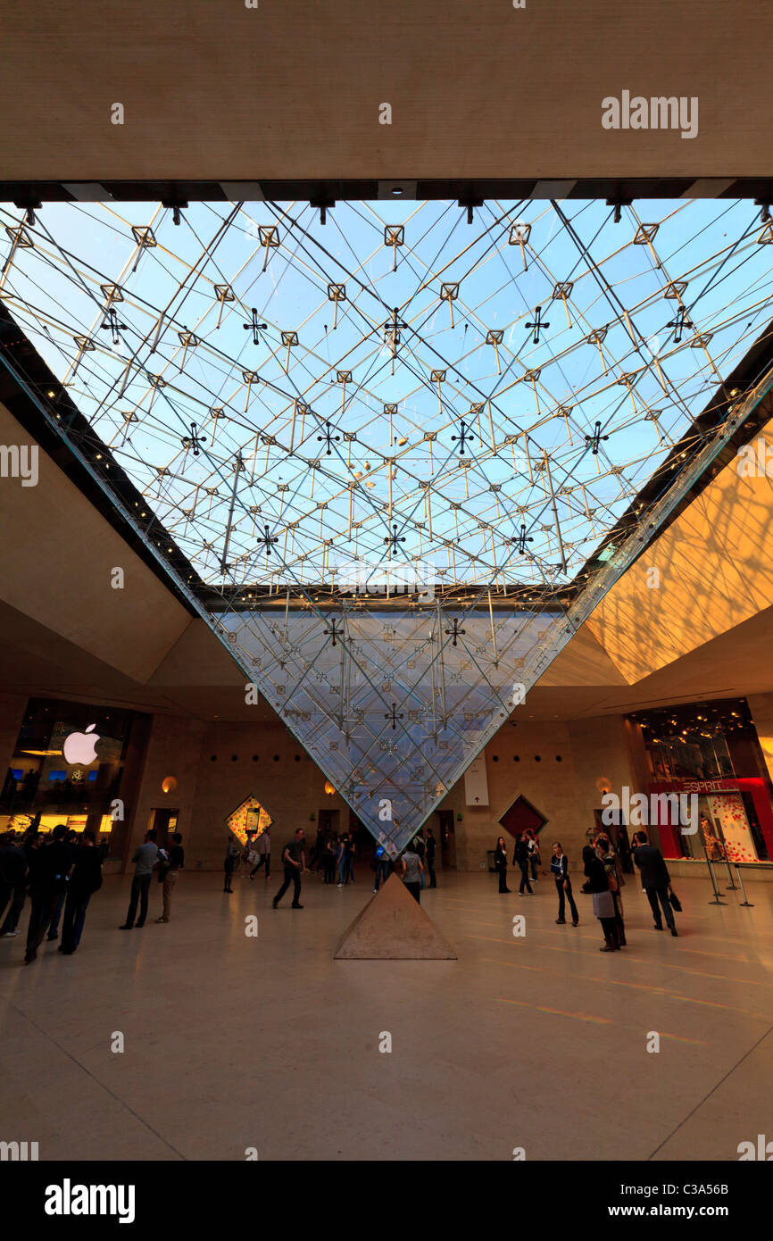 Underneath the glass Pyramid in the Louvre Museum Mall, Paris Stock