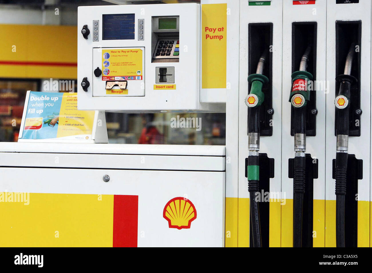 Shell petrol pumps at a Shell petrol station. Stock Photo