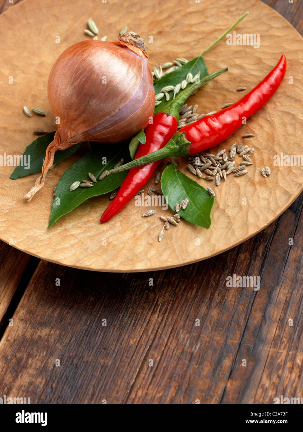 Onion chillies curry leaves fennel seeds Stock Photo Alamy