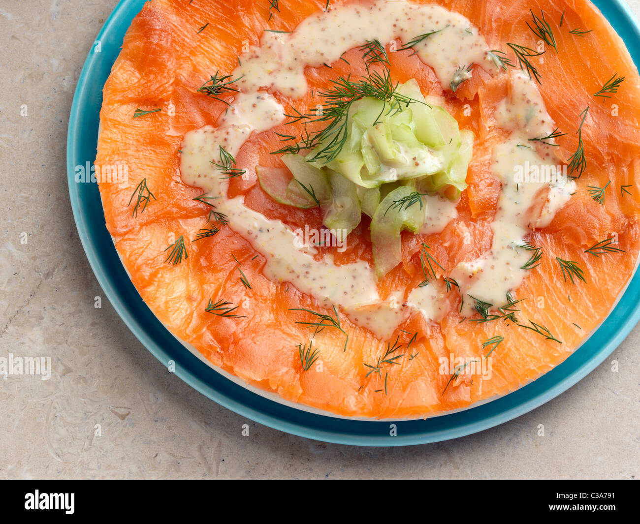 Gravadlax smoked salmon with dill cucumber mustard dressing Marco Pierre White recipe Stock