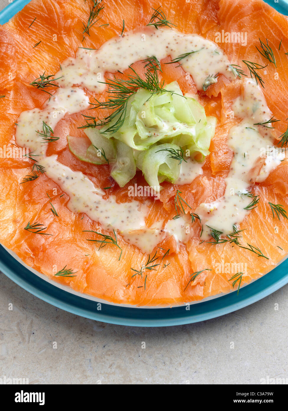 Gravadlax smoked salmon with dill cucumber mustard dressing Marco Pierre White recipe Stock