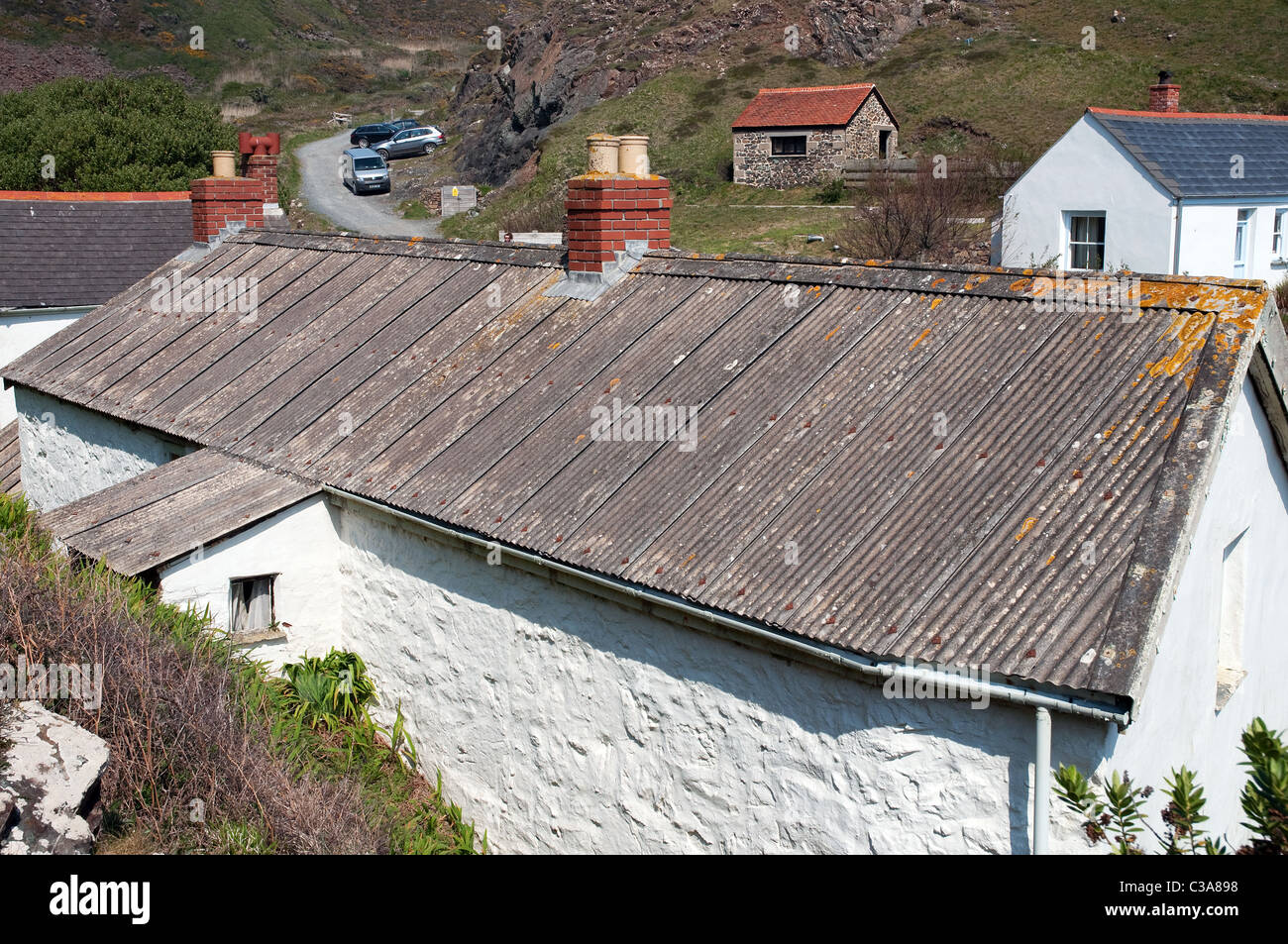 An Asbestos roof on an old cottage in cornwall, uk Stock Photo
