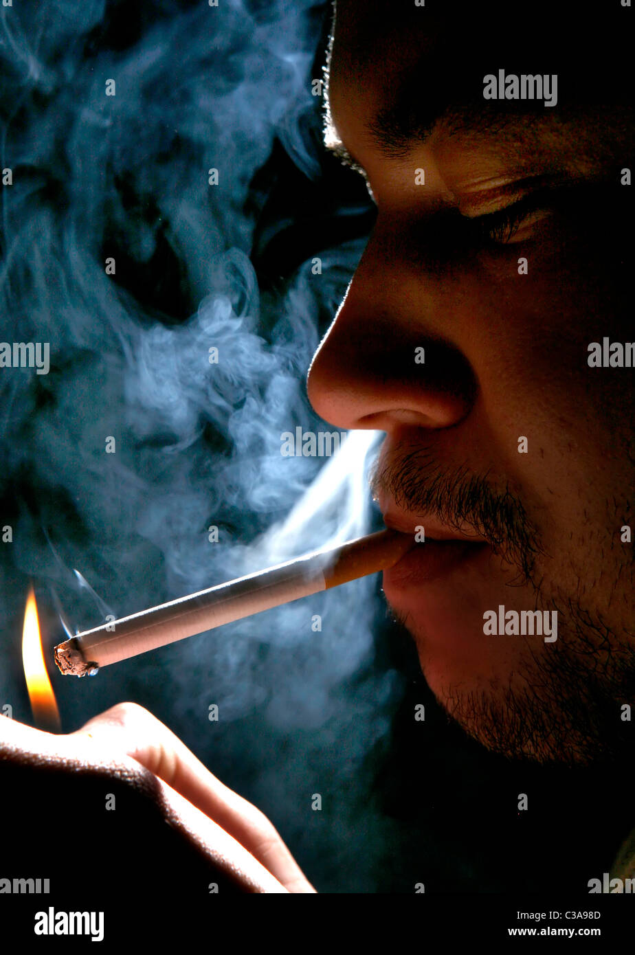 Smoke Cigarette Stock Photos & Smoke Cigarette Stock Images Alamy