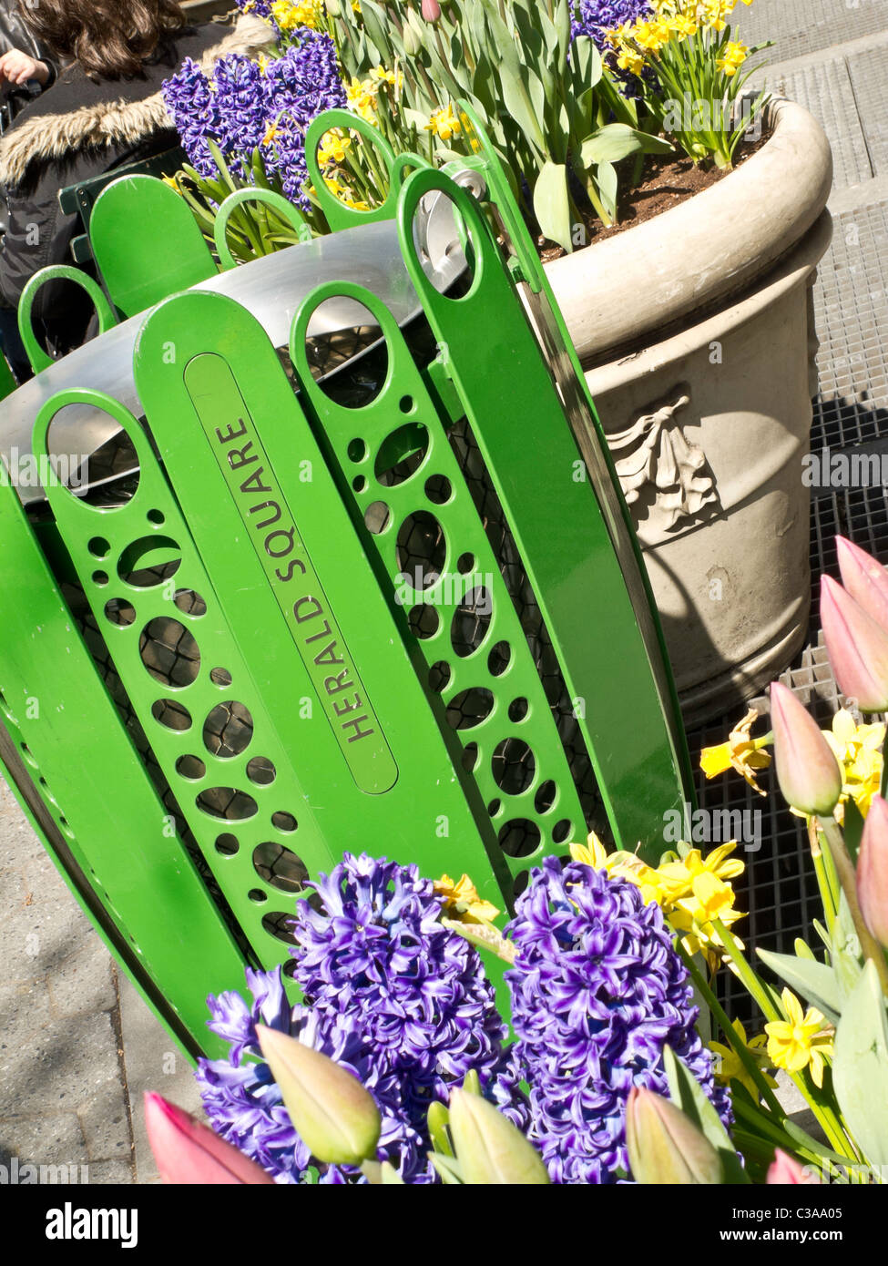 Trash Barrel and Flowerpots, Herald Square Park, NYC Stock Photo