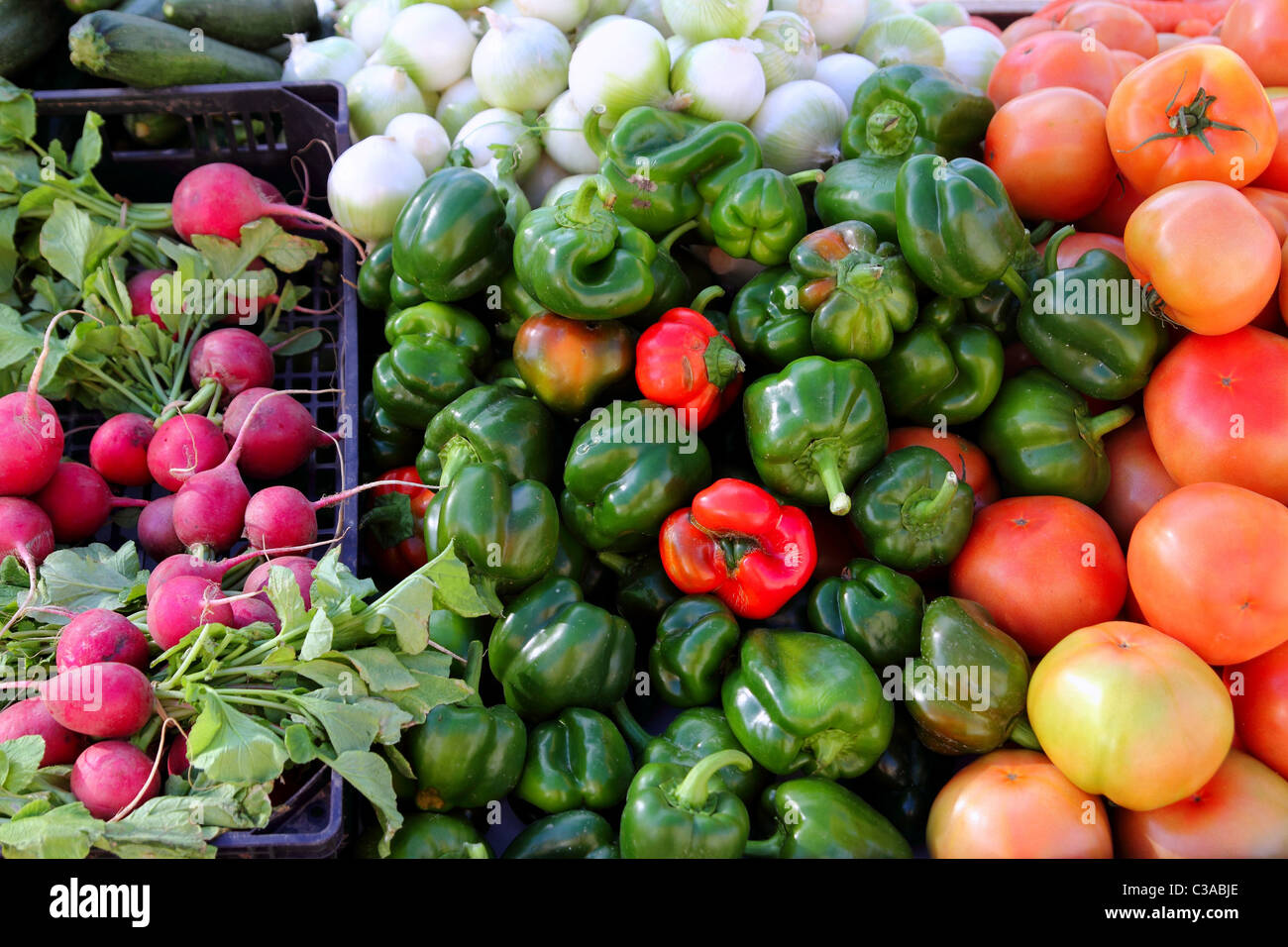 greengrocers radish tomatoes green red peppers pattern Stock Photo