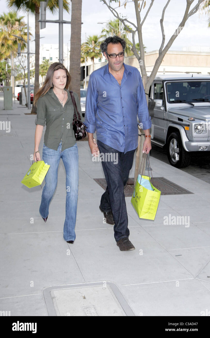 Brad Garrett holding hands with his girlfriend as they walk down