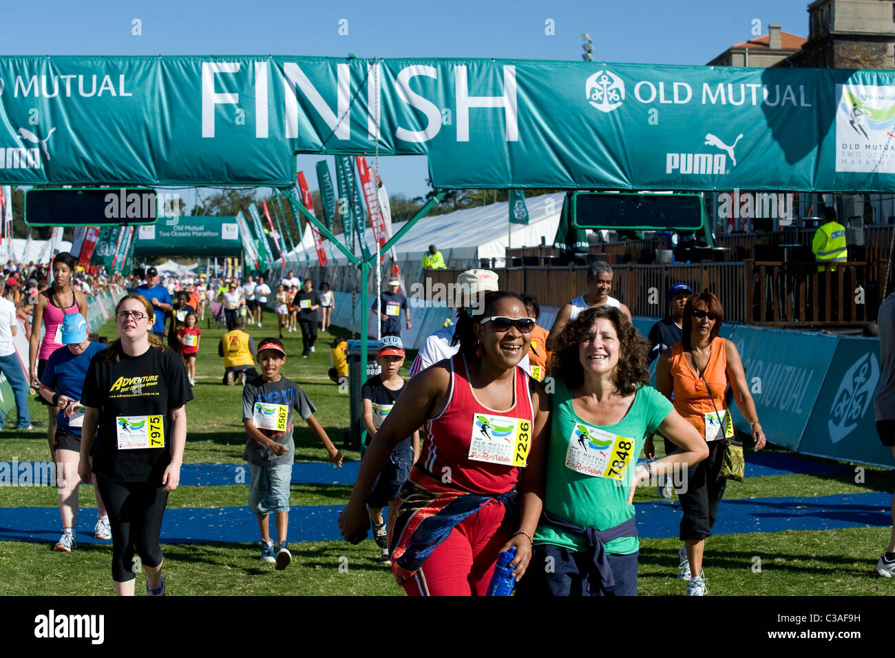 Happy finishers of the 5km Fun Run, Two Oceans Marathon, Cape Town, South Africa Stock Photo