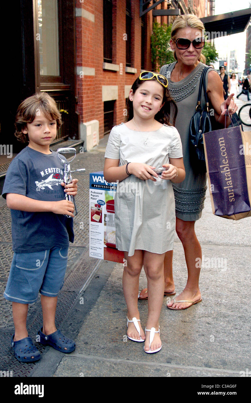 Joaquin Consuelos, Lola Consuelos and Kelly Ripa Kelly Ripa shopping in Soho with her children while carrying a professional Stock Photo