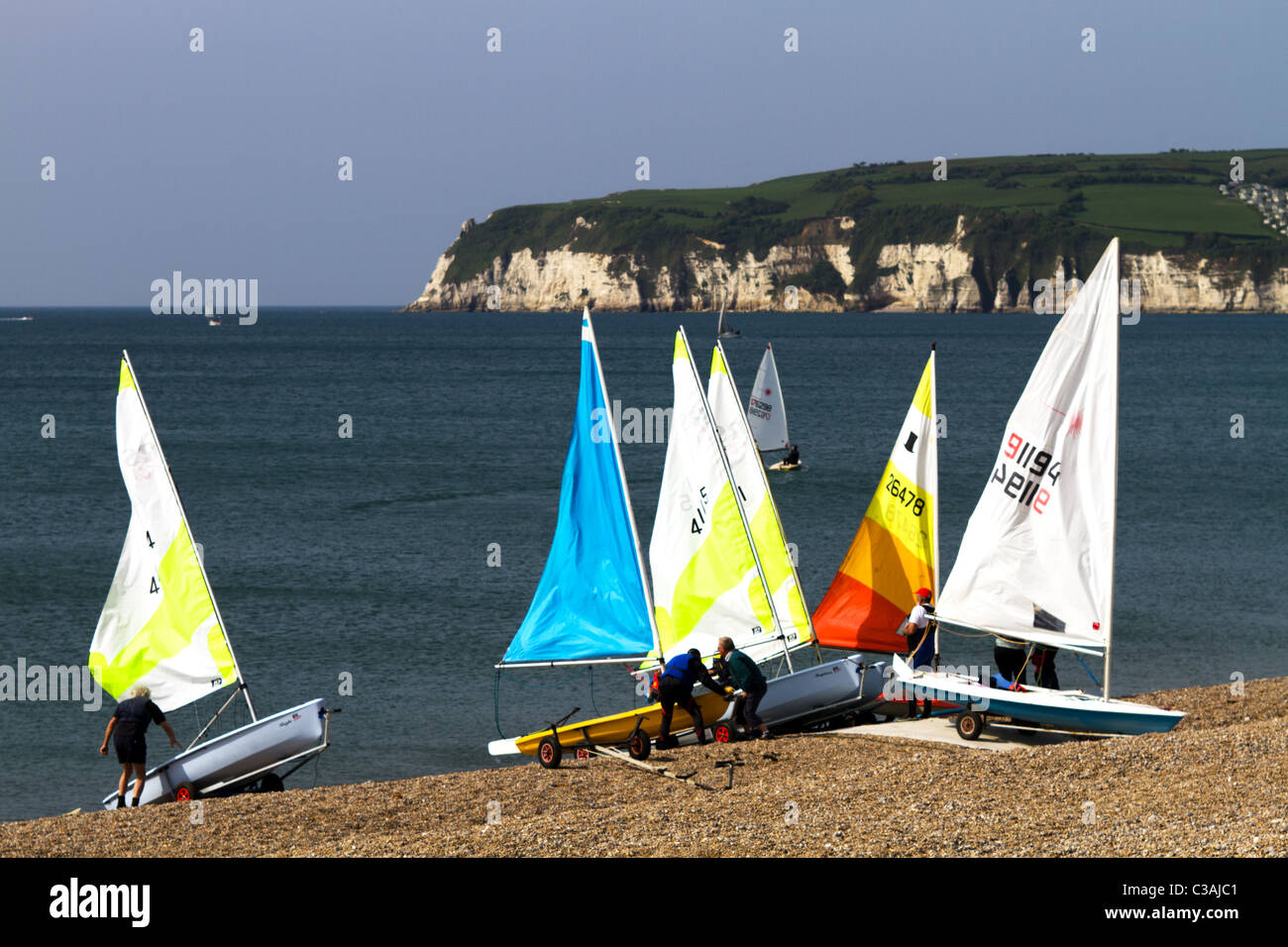 Sailing Dingies being prepared for a days racing off the Devon Coast Stock Photo
