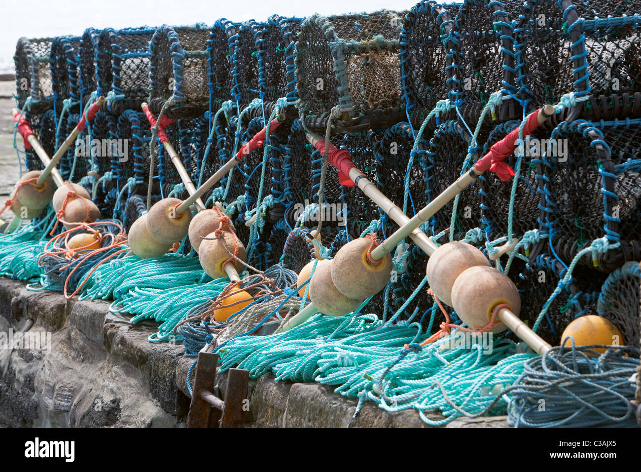 Stacked Creels ready for fishing. Gourdon harbour. Scotland Stock Photo