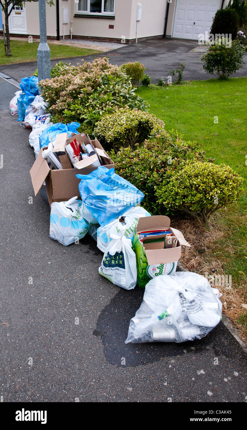 Recyclable household waste put out for kerbside collection. Householders sort the waste into eg