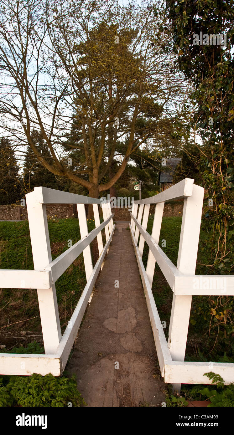 Striking white foot bridge in Dalham, Suffolk Stock Photo