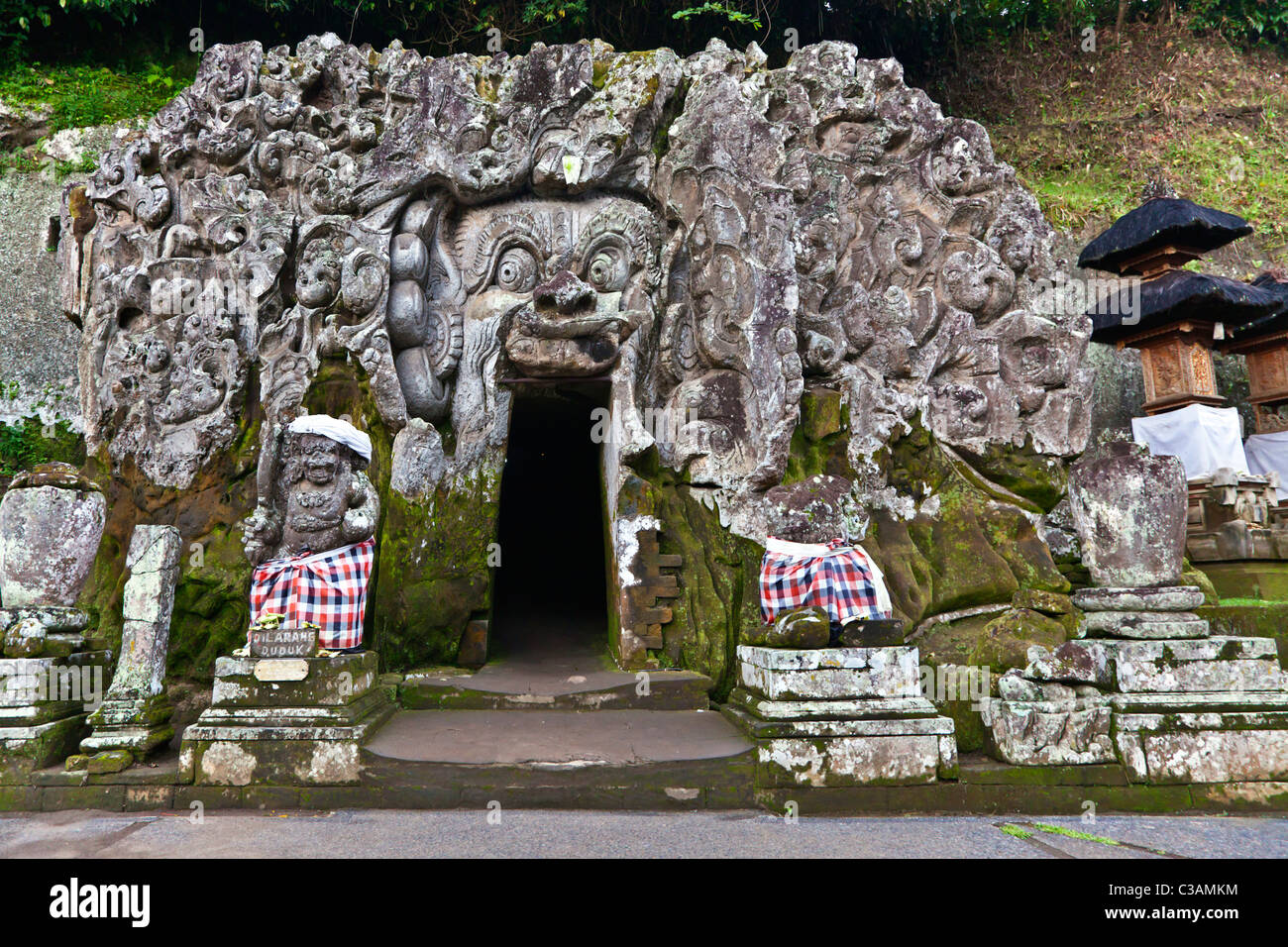 Horrific protective deities at the HINDU SHRINE GOA GAJAH also known as the ELEPHANT CAVE, 9th Cenury - UBUD, BALI, INDONESIA Stock Photo