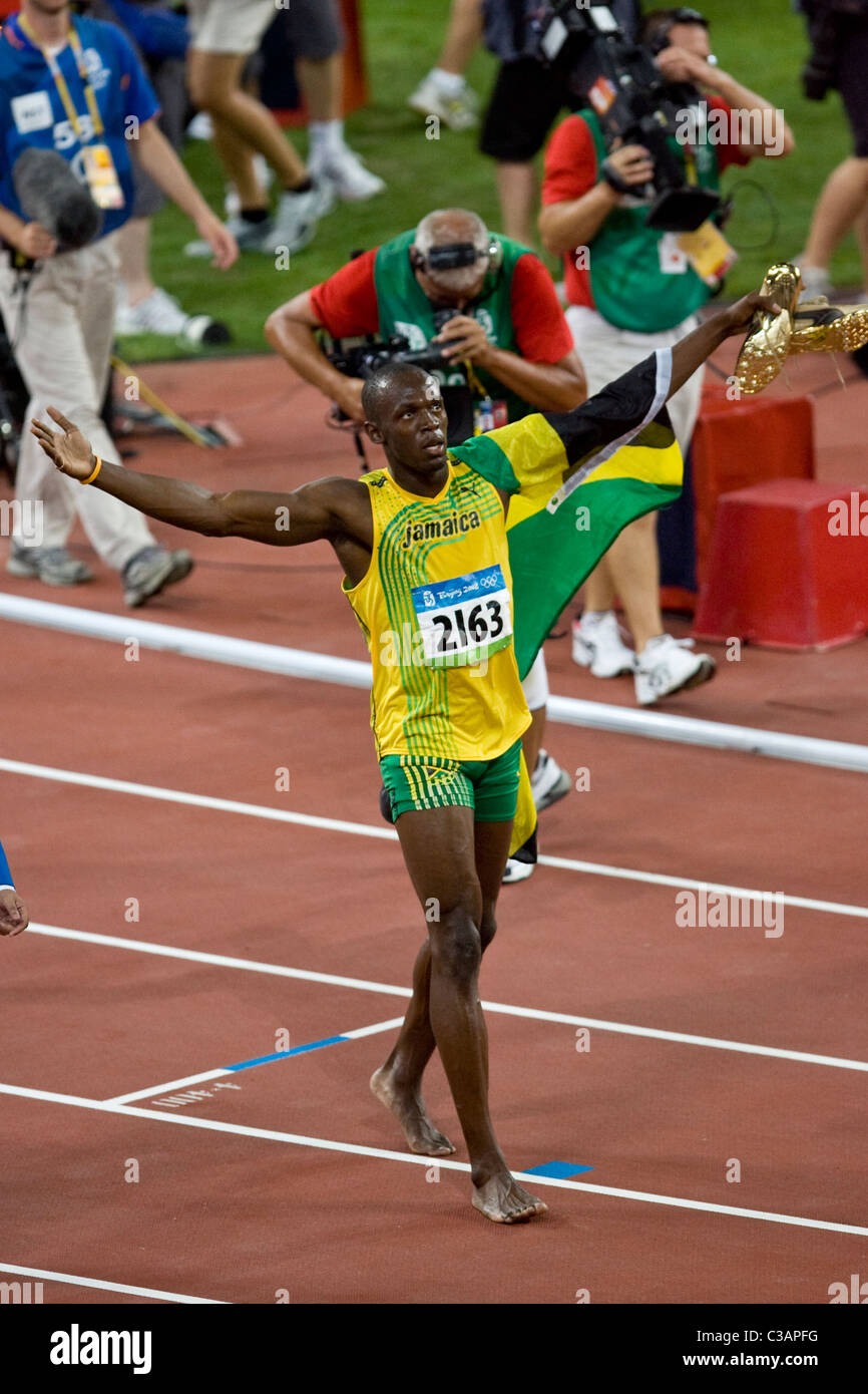 Usain Bolt wins the 100m in world record time of 9.69 seconds at the 2008 Olympic Summer Games, Beijing, China Stock Photo