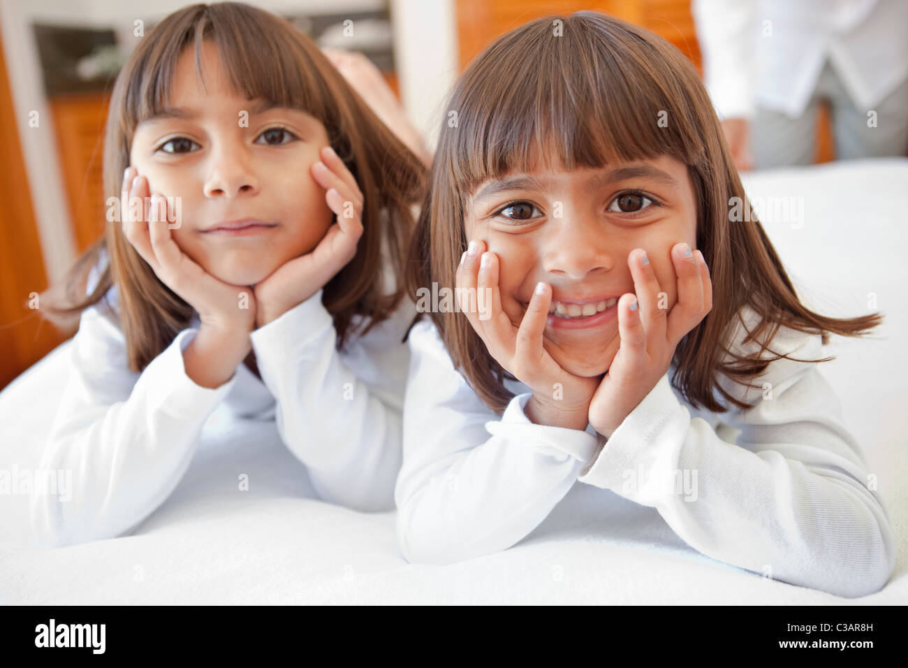 portrait of two smiling young girls Stock Photo