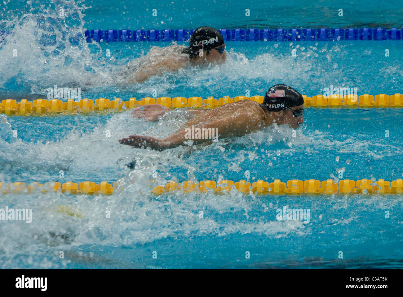 Michael Phelps swimming the butterfly leg of Men's 4x100 medley relayin the swimming competition at the 2008 Olympics Stock Photo