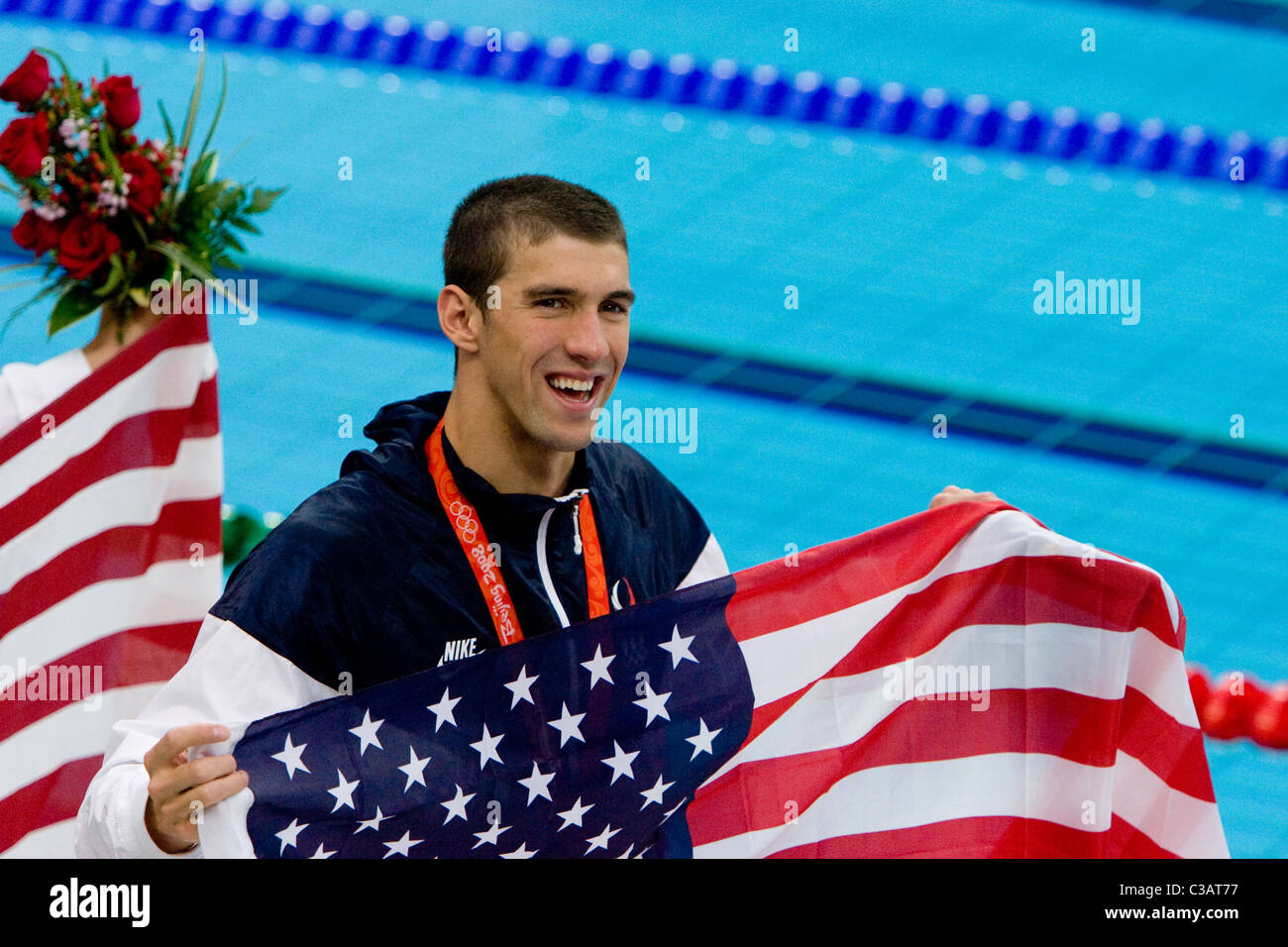 Michael Phelps gained his record breaking eight gold medal in one Olympics for the Men's 4x100 medley relay in the swimming Stock Photo