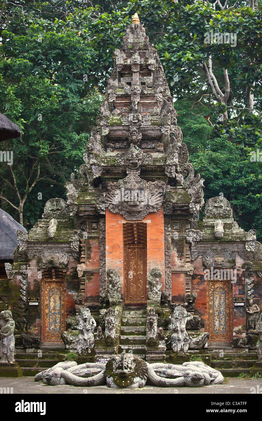The Hindu temple PURA NAGA SARI is found in THE MONKEY FOREST PARK - UBUD, BALI, INDONESIA Stock Photo