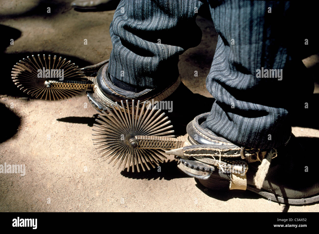 A pair of fancy handcrafted silver spurs buckled to the boots of an  Argentine gaucho (cowboy) glisten in the sunshine in Argentina, South  America Stock Photo - Alamy