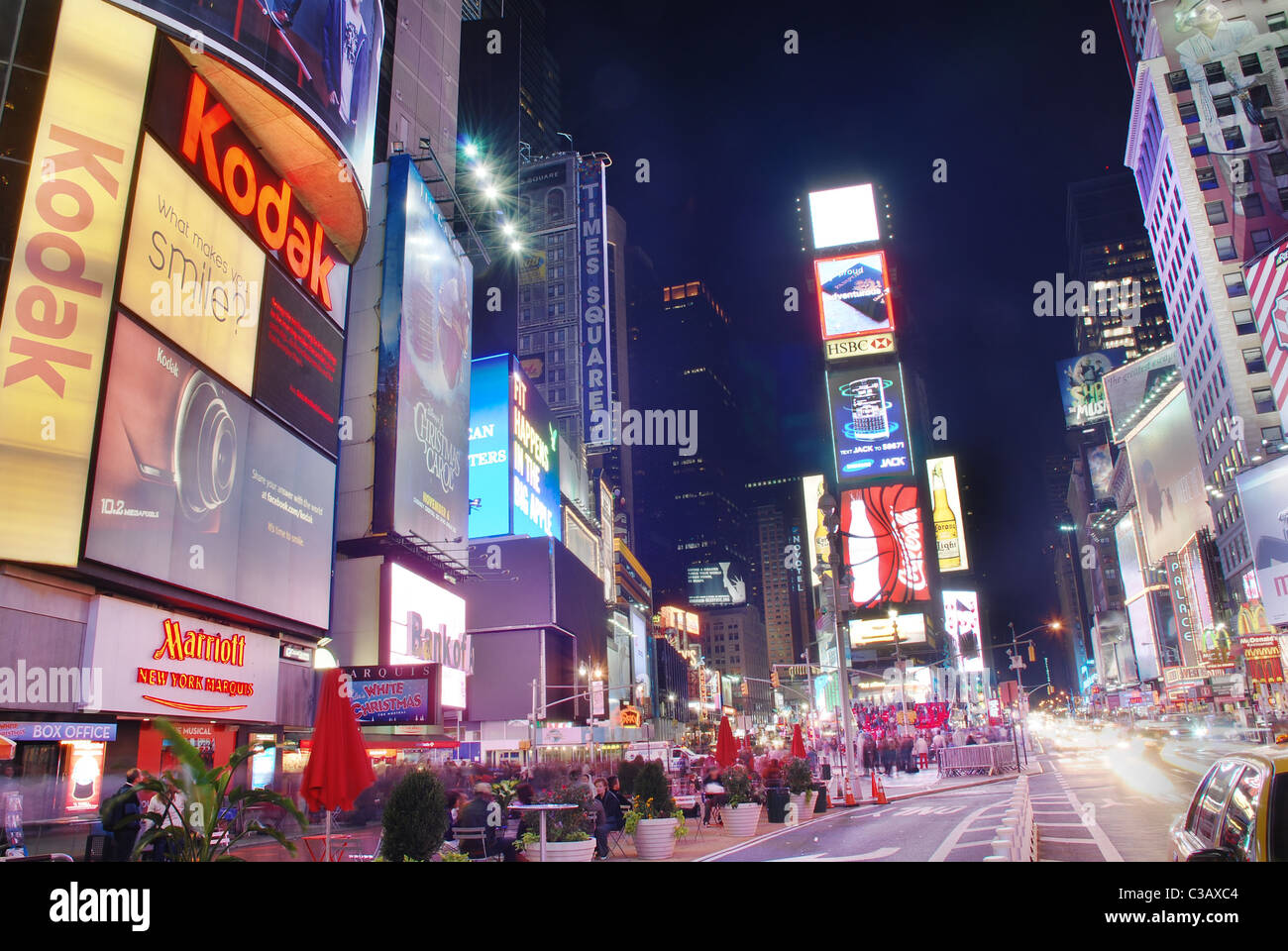 Times Square at night street view with busy traffic in Manhattan, New York  City Stock Photo - Alamy