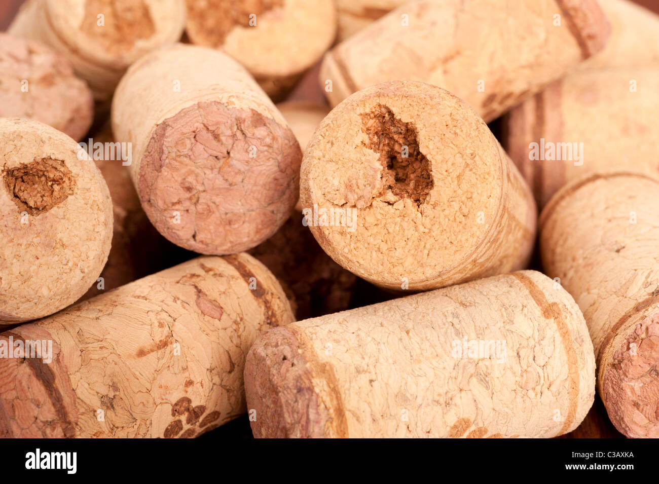 A pile of used wine bottle corks, also known as stoppers. Stock Photo