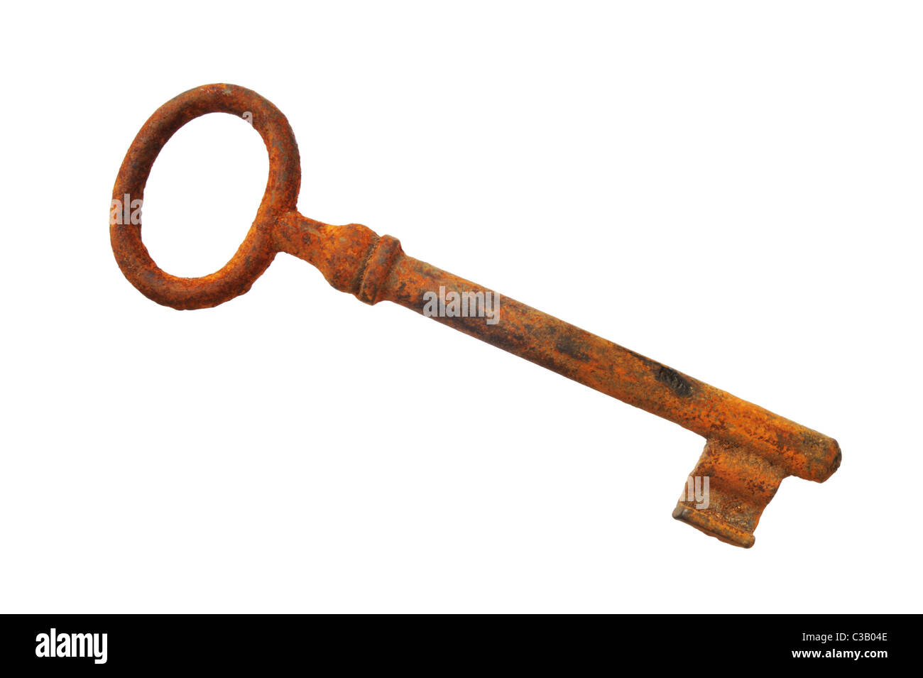 Old rusty key isolated on white background. Clipping path included Stock Photo