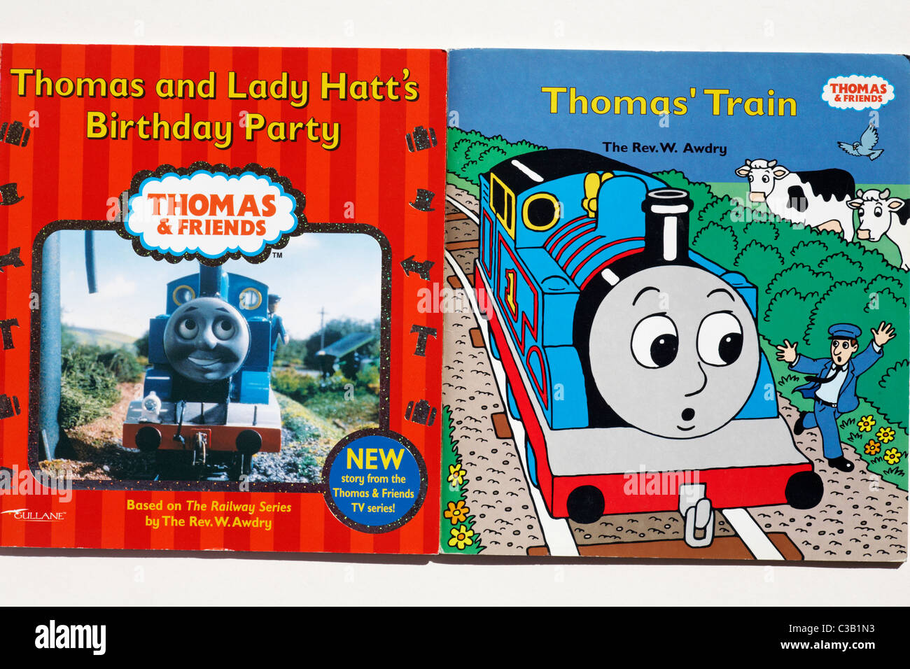 Two Thomas the tank engine books - Thomas' Train and Thomas and Lady Hatt's Birthday Party on white background Stock Photo