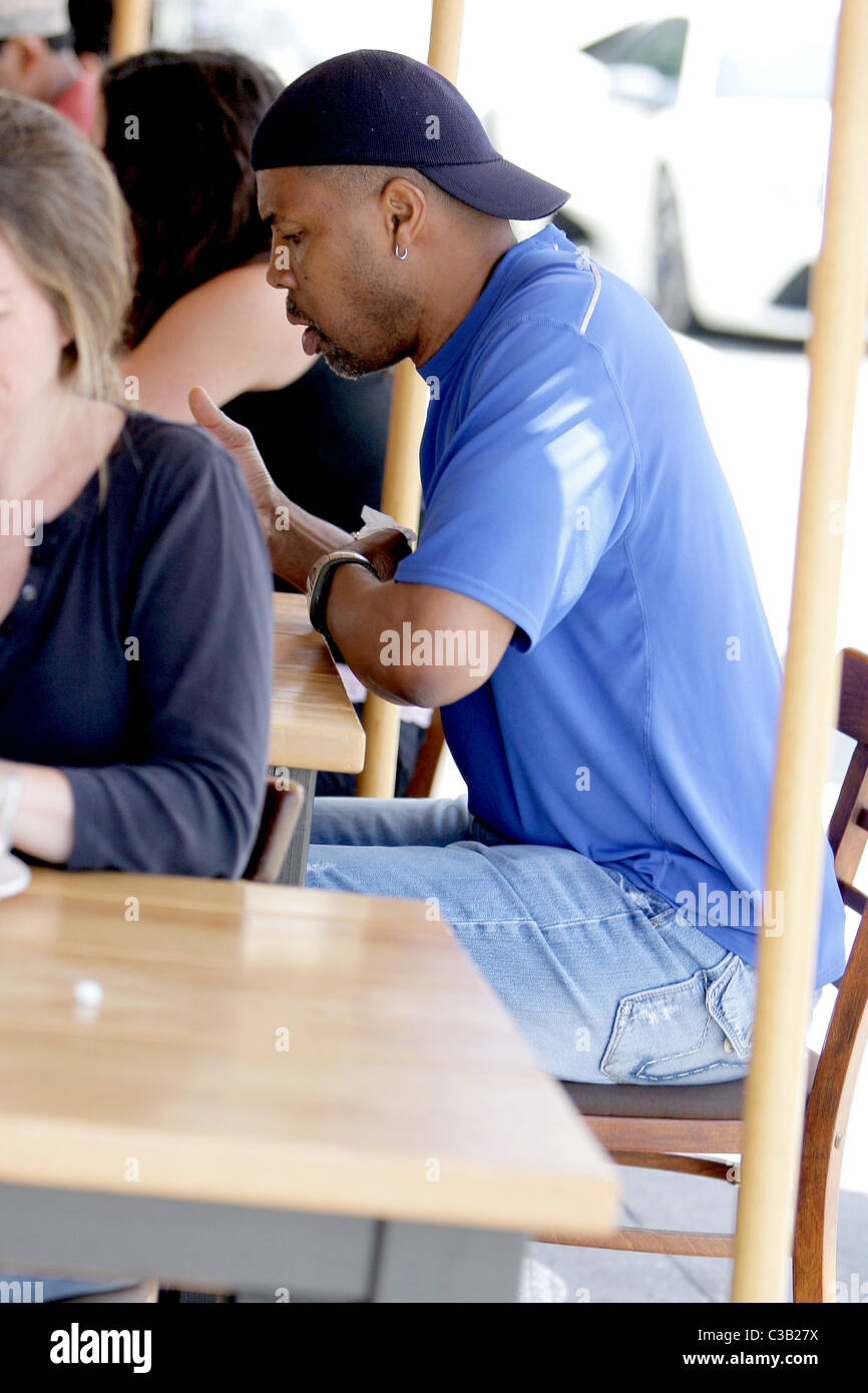 Eriq La Salle eating at Toast Bakery Cafe while wearing a backwards ...