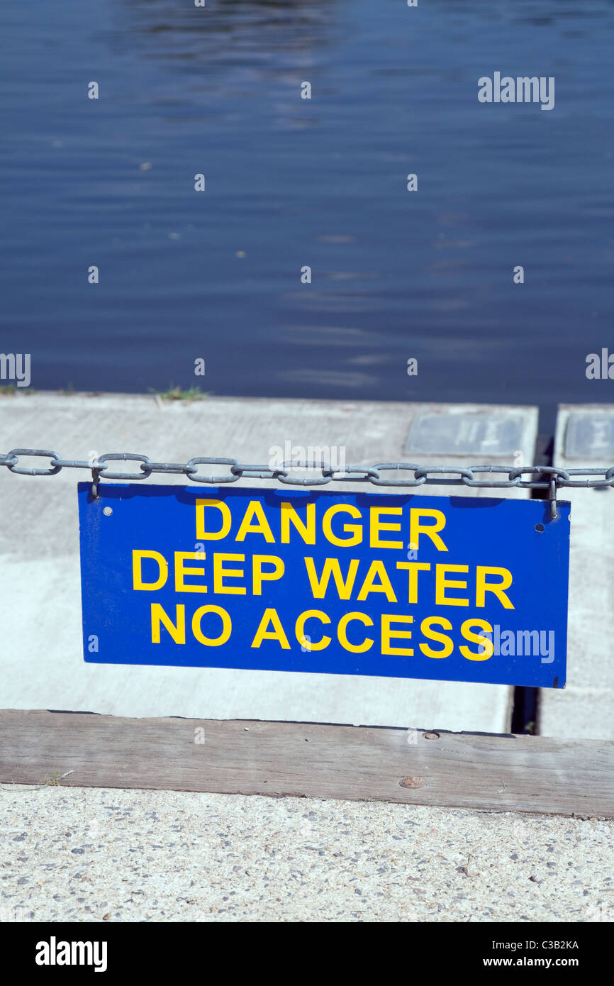 Danger Deep Water sign at the river Thames in Oxfordshire, UK Stock Photo