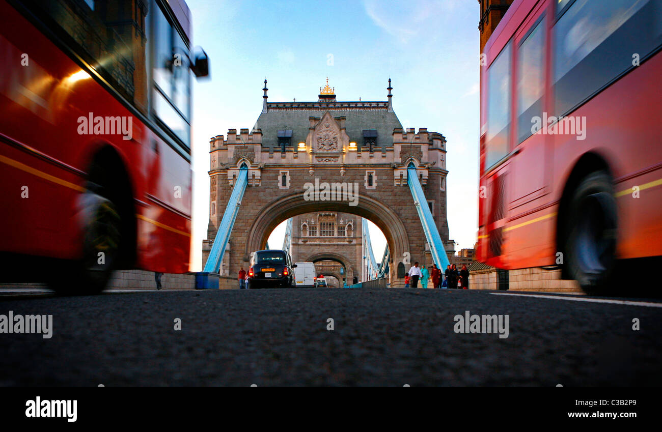 Rush-hour traffic on the Tower Bridge at dusk Stock Photo