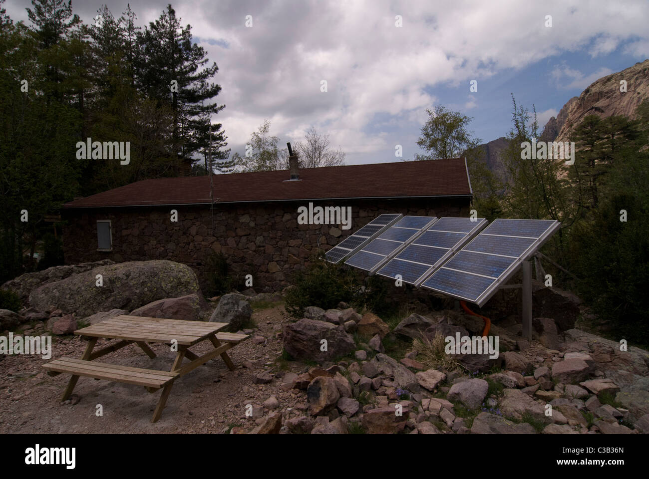 Mountain lodge with solar panels, Corsica, France Stock Photo