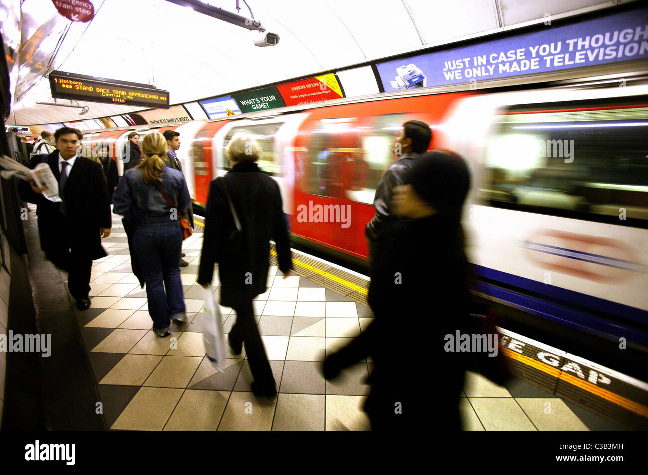 Passengers on a London Underground platform. Stock Photo