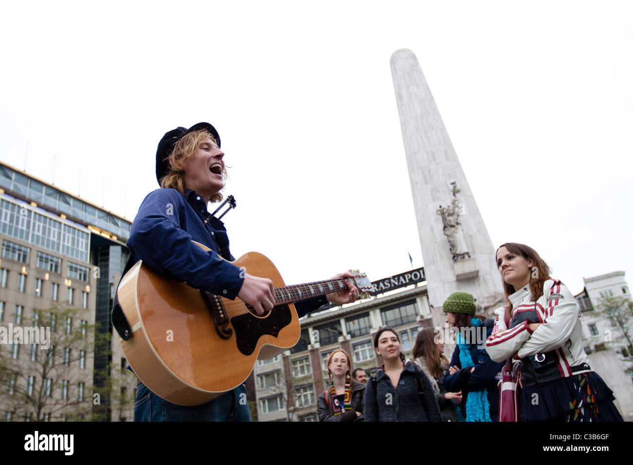 A musician entertains the crowd at Dam Square in Amsterdam Stock Photo