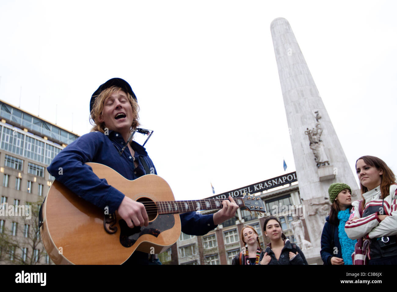 A musician entertains the crowd at Dam Square in Amsterdam Stock Photo