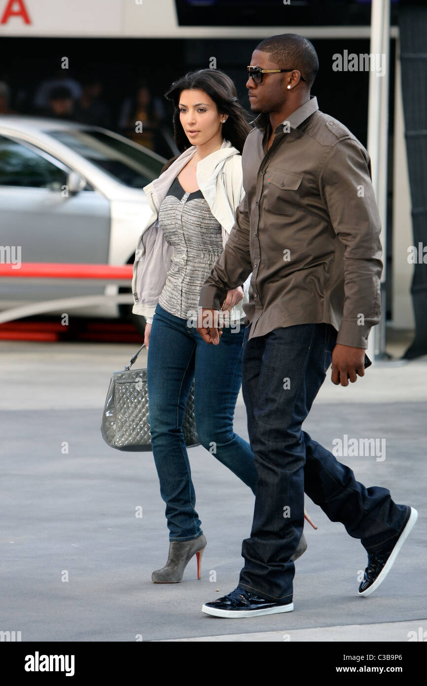 Kim Kardashian and Reggie Bush Celebrities arrive to watch the Los