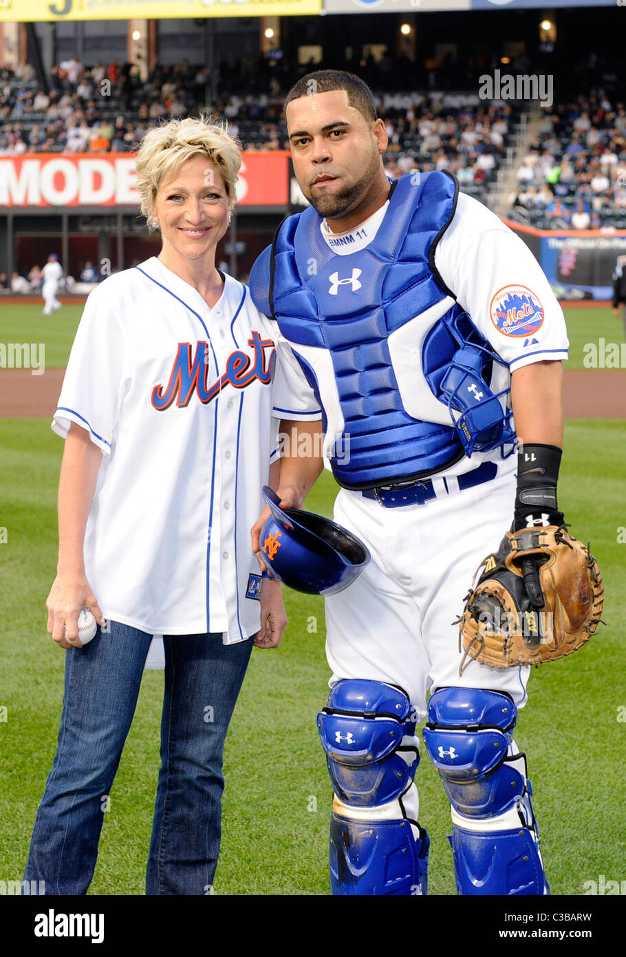 Edie Falco and Mets catcher Ramon Castro, who caught the first pitch Actress and Brooklyn native Edie Falco threw out the Stock Photo